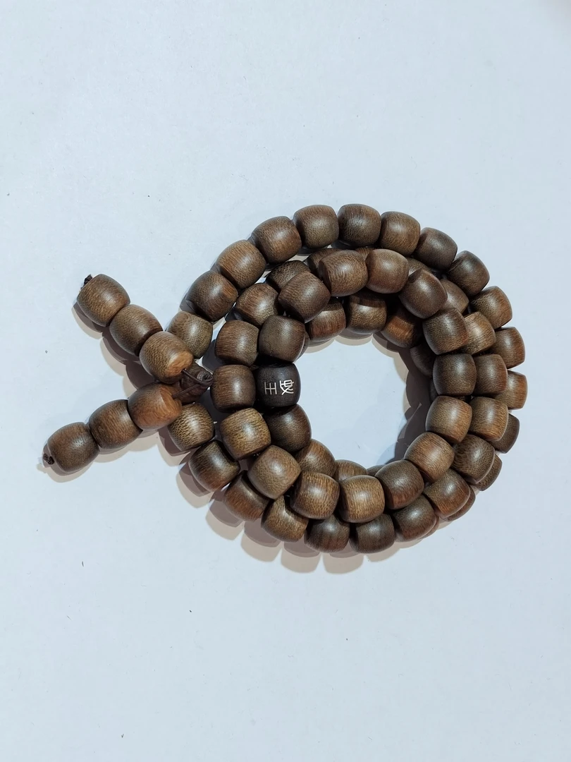 沉香  香港糖结玉化黄奇老料长串1.3鼓珠