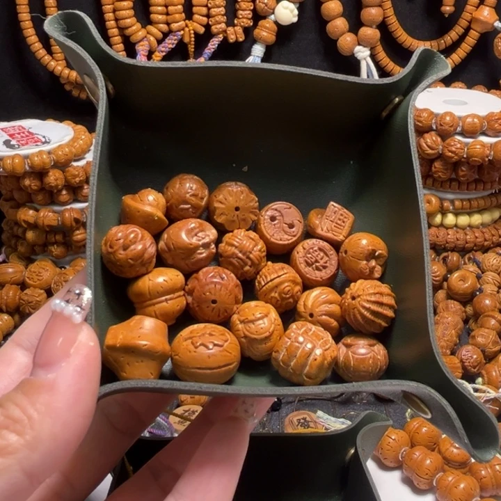 沧***粟手串桃核多宝手持