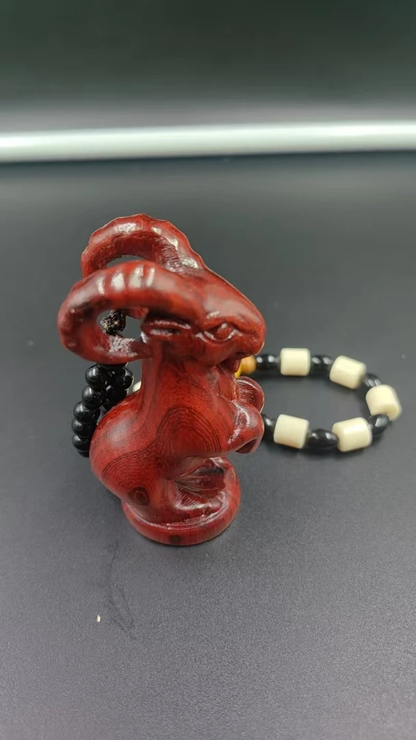 非洲紫檀羚跃吉祥手把件