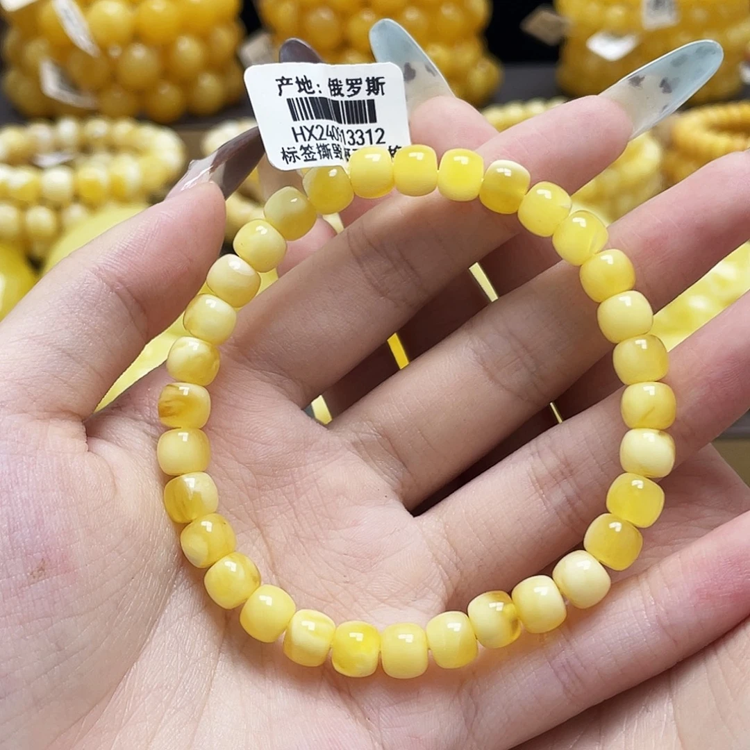 琥珀未镶嵌裸石6.9mm金白老型手串微瑕