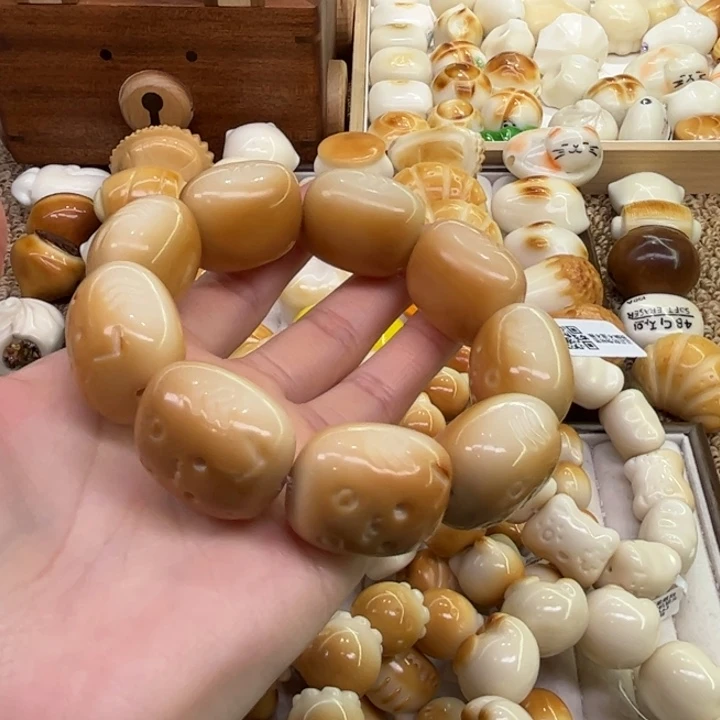 菩提根/象牙果把件12.31.23象牙果炭烤年糕猫微瑕