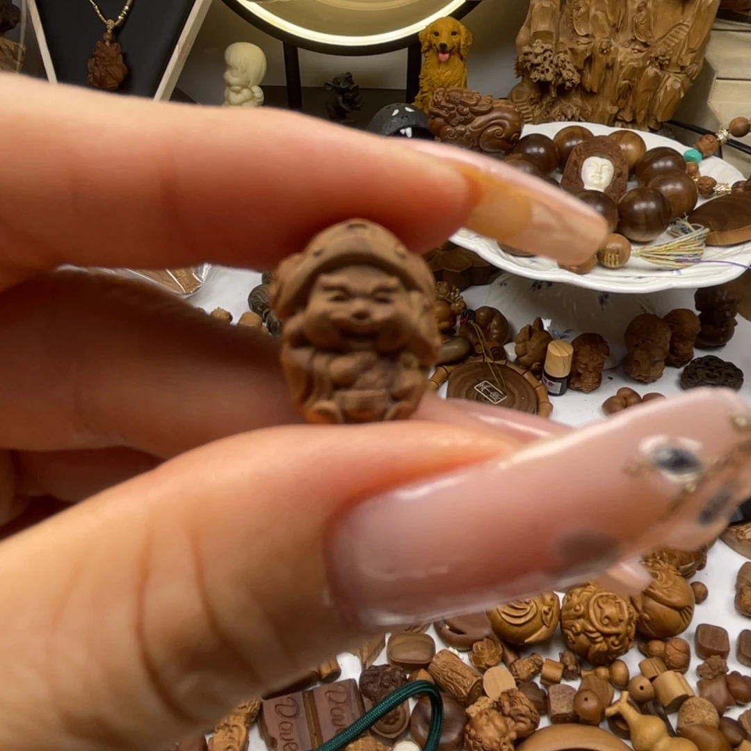 长***.无事牌檀香木瑕疵财神