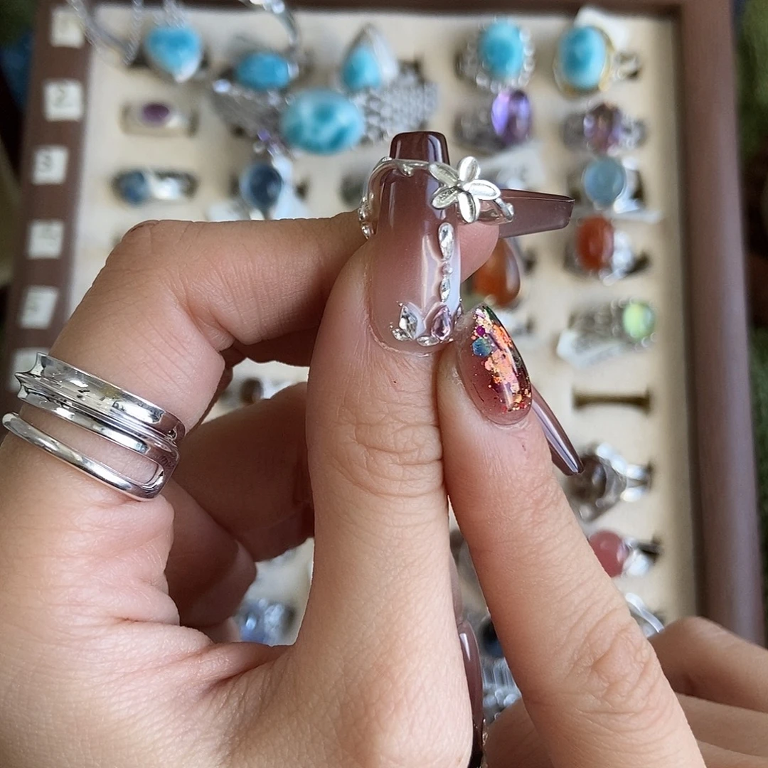 阿***娘戒指烟晶银S925镶嵌花花75