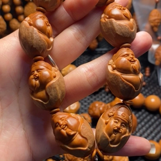 橄榄核吊坠包衣财神