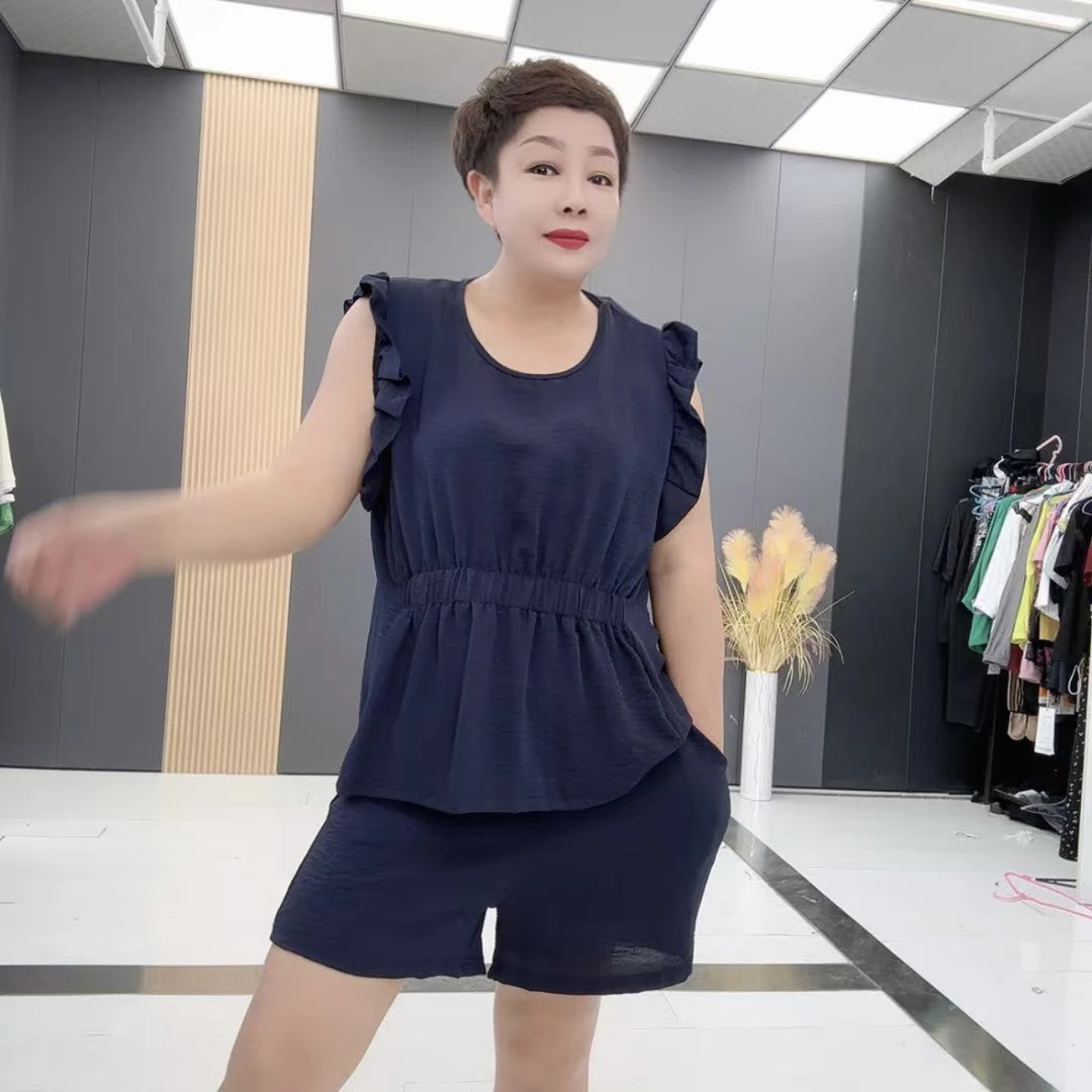 7105*款大码时尚夏季减龄洋气显瘦休闲凉快砍秀袖短袖+短裤套装