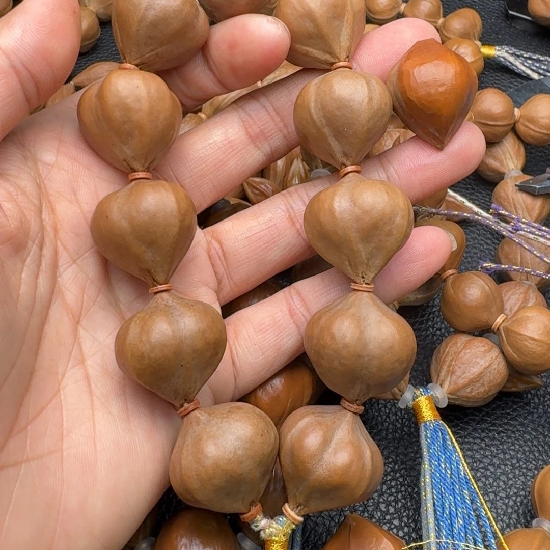 飞***飞橄榄核摆件1111111