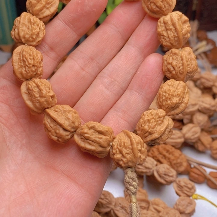 幸***是桃核手串蛤蟆头尺寸17