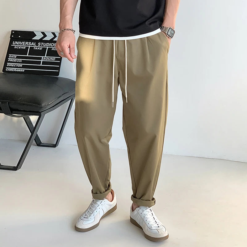 徐太浪卡其色透气休闲裤男2025新款春季宽松抽绳松紧腰小脚裤长裤