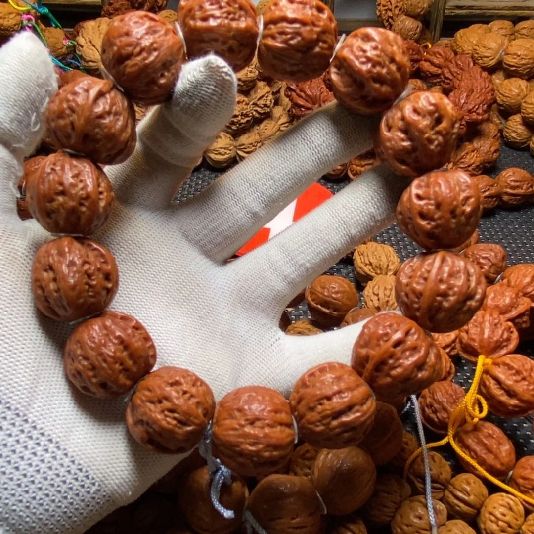5***，手串文玩核桃红皮方墩