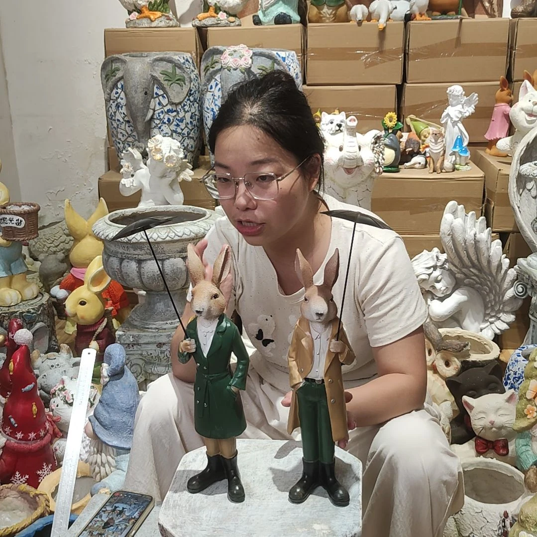 合成树脂树脂打伞兔一对