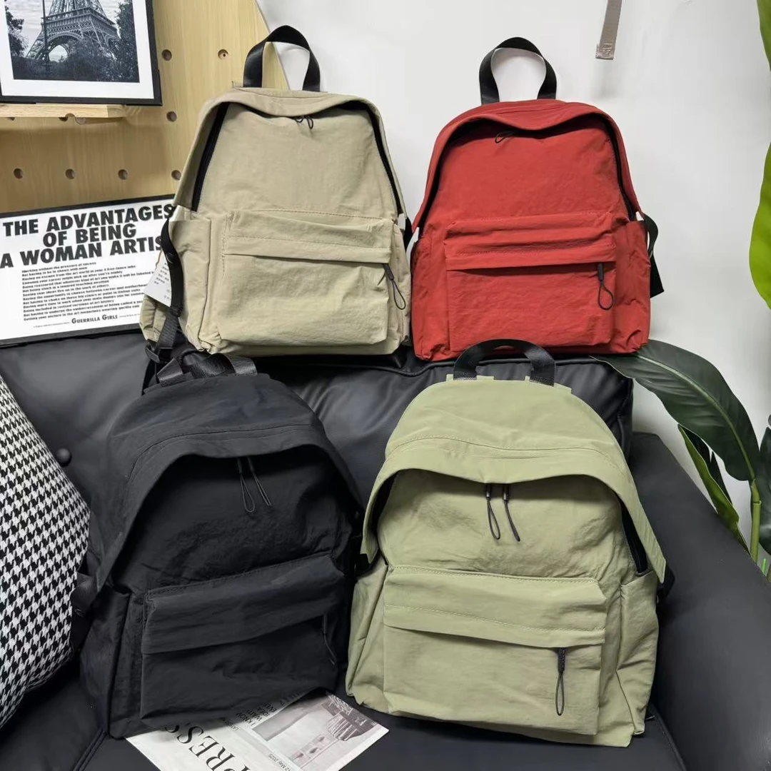韩版中性防水尼龙大容量双肩包学院风初中大学生书包潮流出游背包