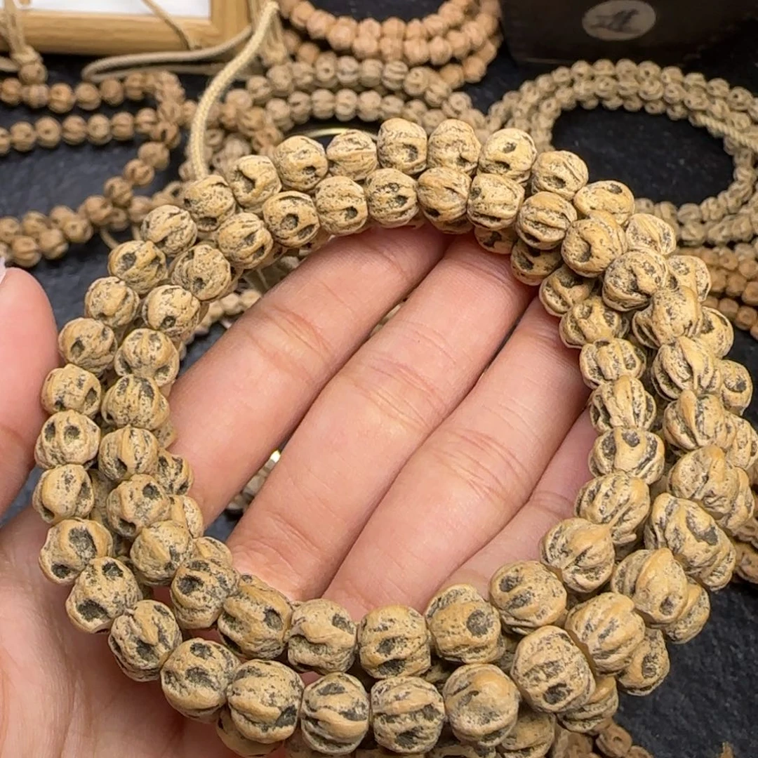 柏香籽/百香籽吊坠七*马