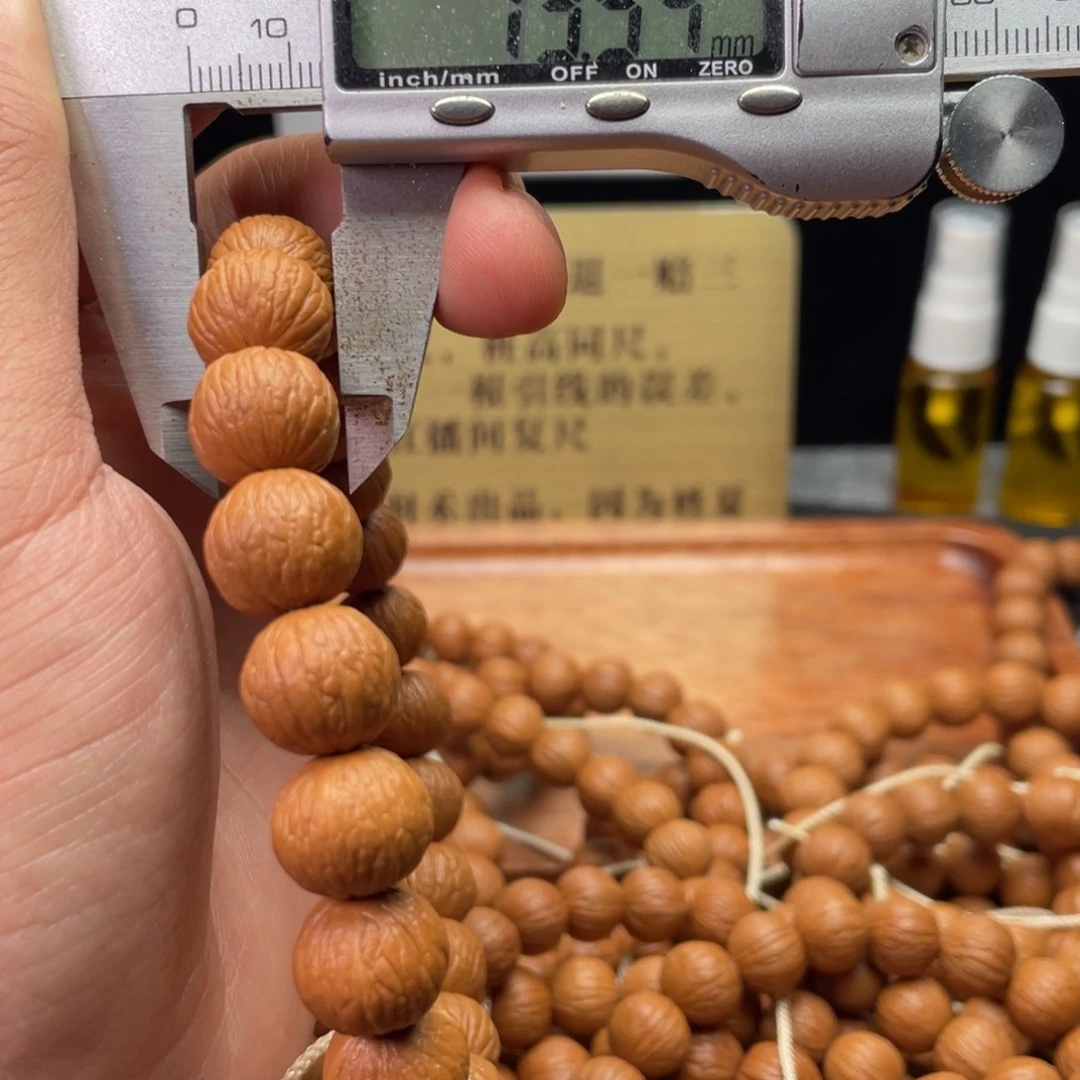 猴头核桃吊坠凤羽