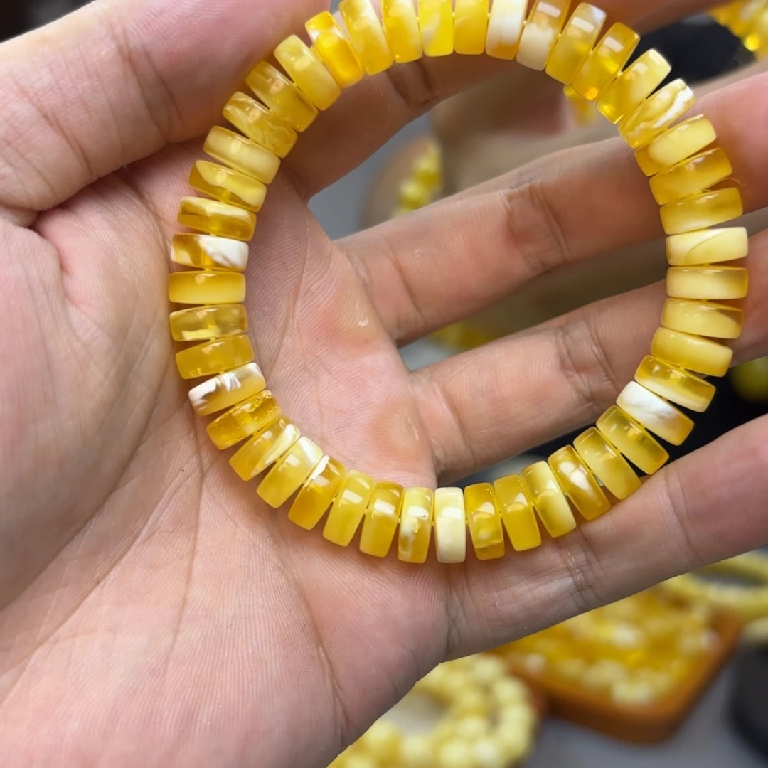 张***兴琥珀未镶嵌手链卡 10 金瓷白药片