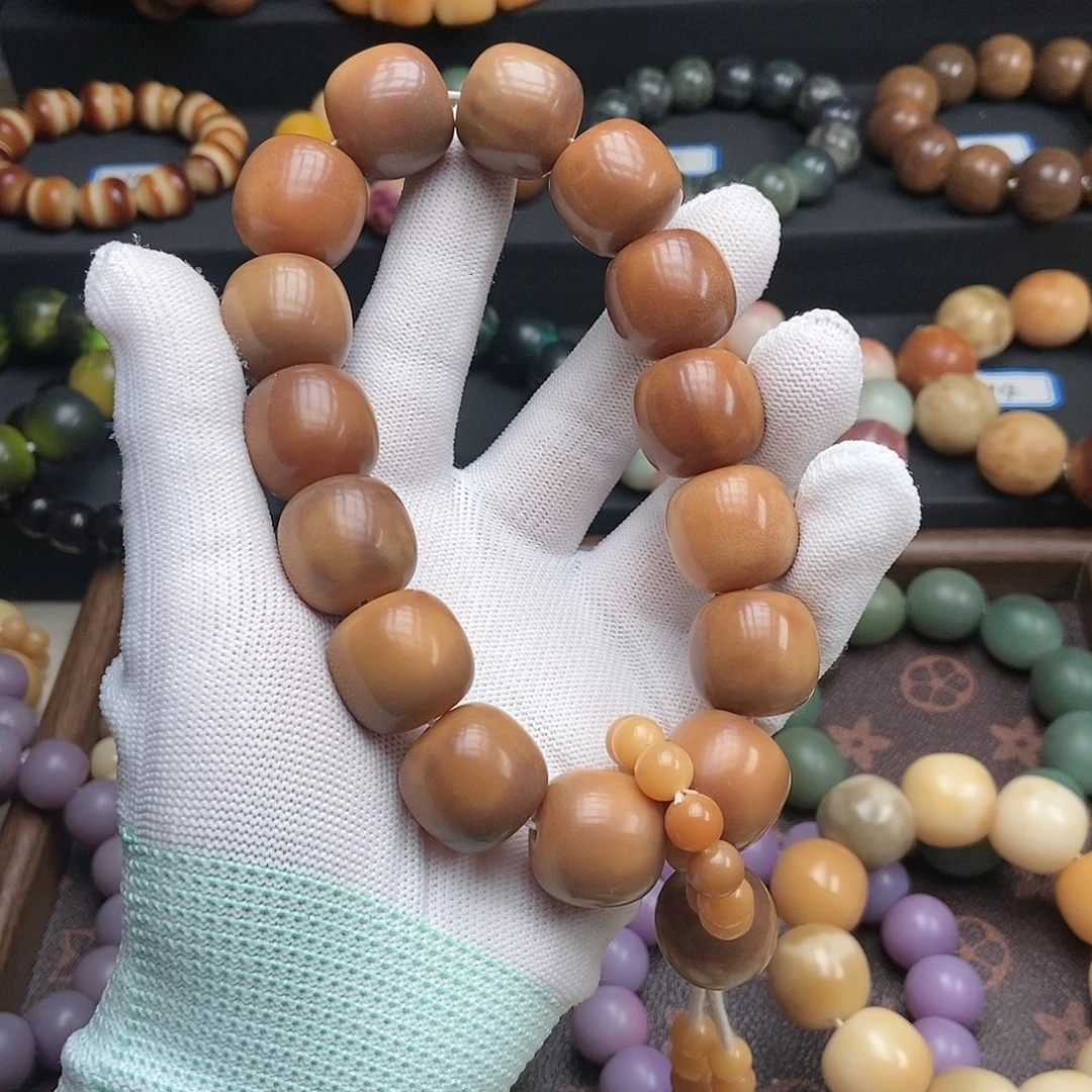 吊坠菩提根/象牙果老料手持