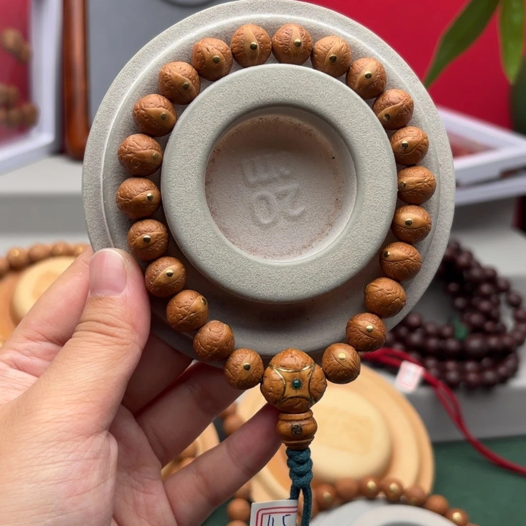 2***迈凤眼菩提手串11.5左右镶嵌铜钉手串