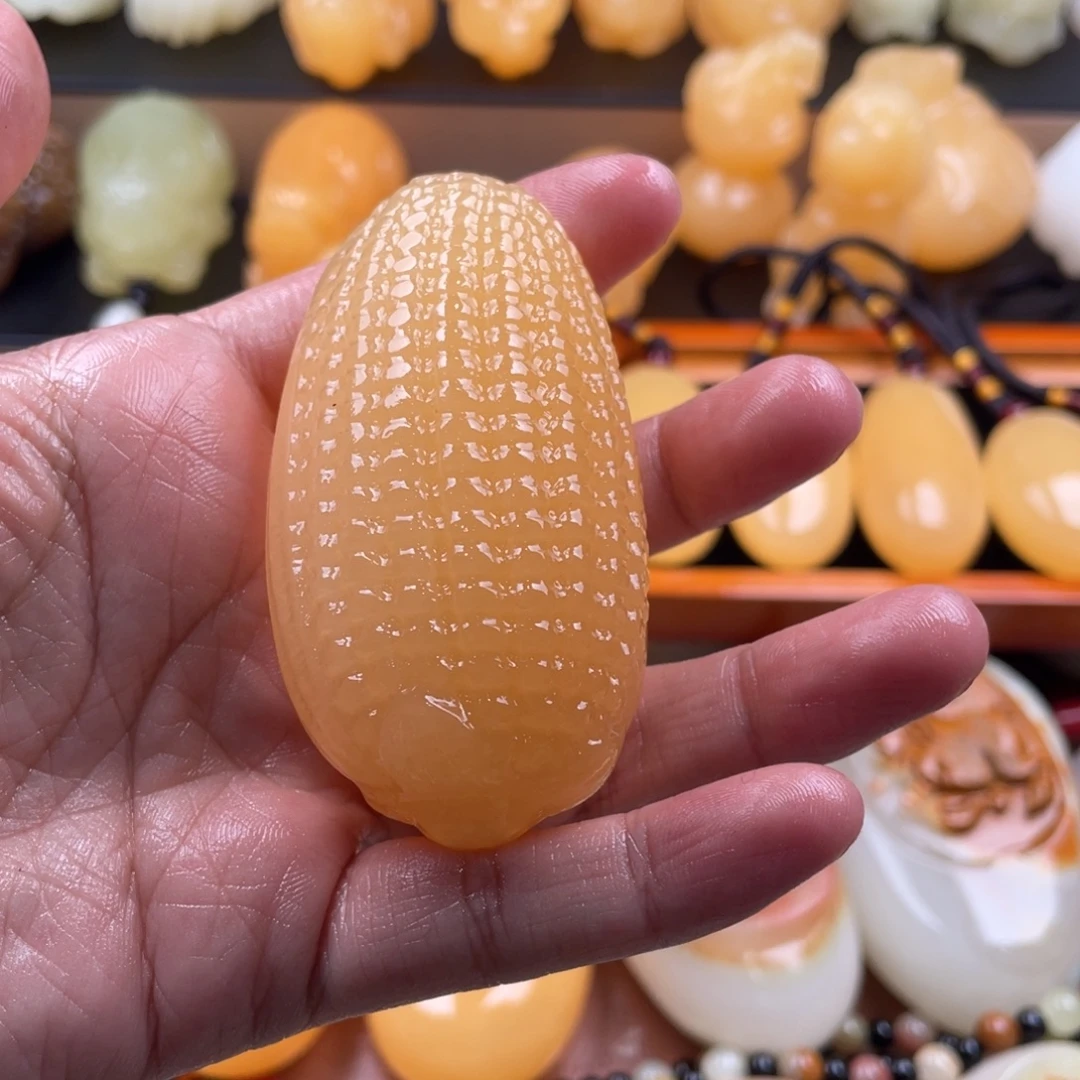 摩***恩石材天然古青石手把件