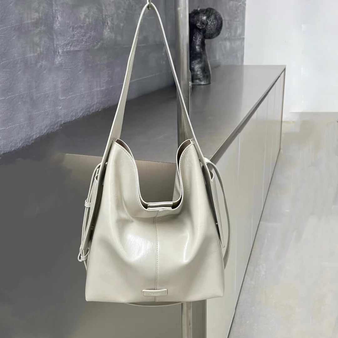 2025春季新款女士挂耳包手提斜挎包