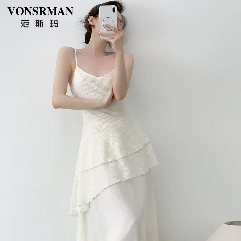 精致气质杏色V领吊带洋气女法式今年流行不规则A字裙收腰度假长裙