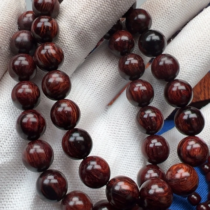 花梨木类红降10圆珠黑肉满油单圈