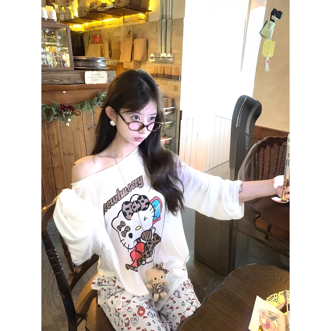 可爱卡通KT猫印花防晒罩衫上衣+豹纹蛋糕裙两件套 配链条公仔