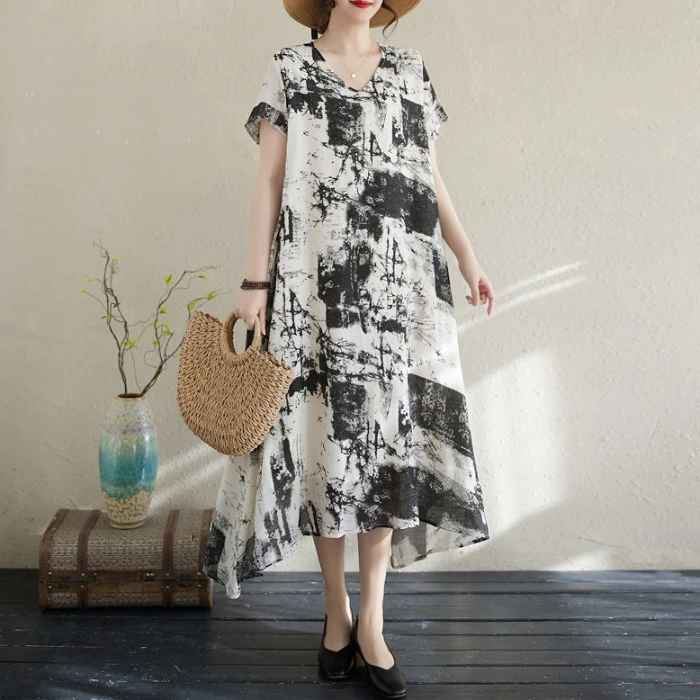 度假风洋气减龄时尚v领长裙女文艺大码不规则宽松水墨印花连衣裙