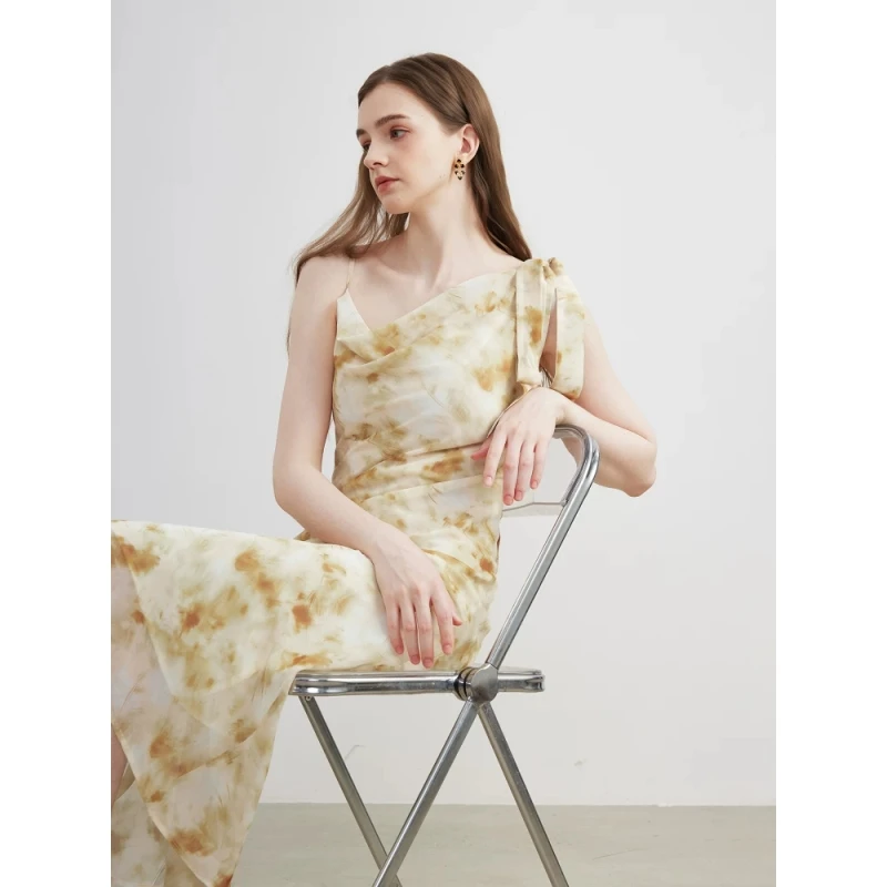 CHELIGNE原创设计2025夏季新款黄色碎花法式高级感吊带气质连衣裙