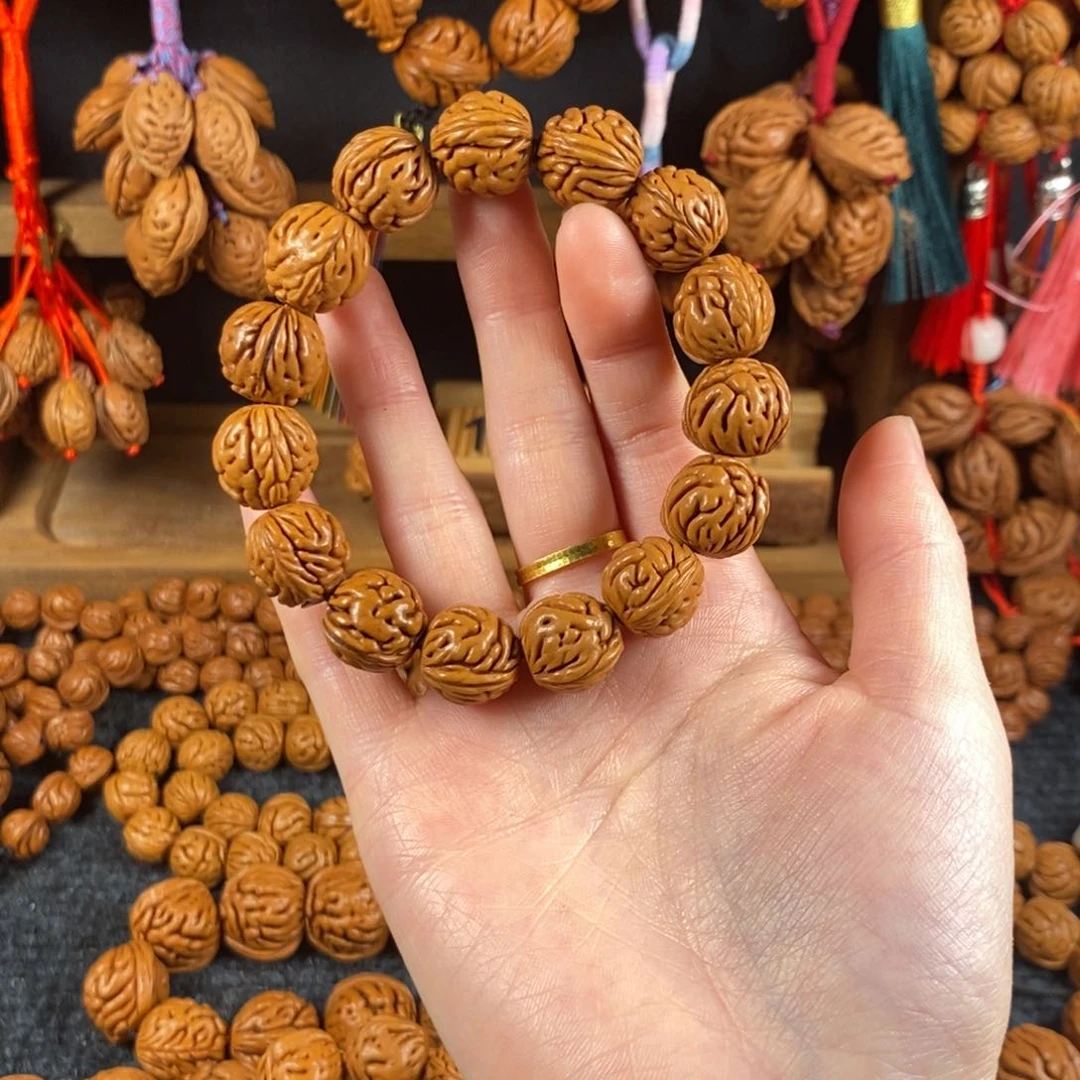 吊坠桃核8链接桃枭手串