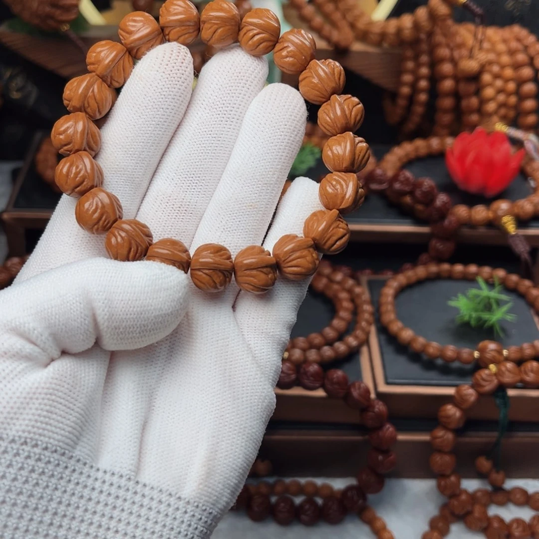 吊坠桃核回**来14新款双脊龙手串