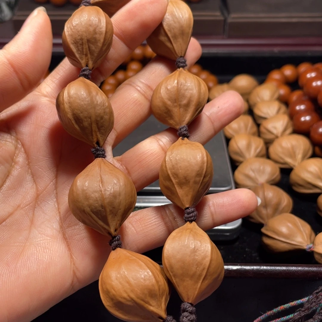 橄榄核手串/手链小*里2.4大四花10颗