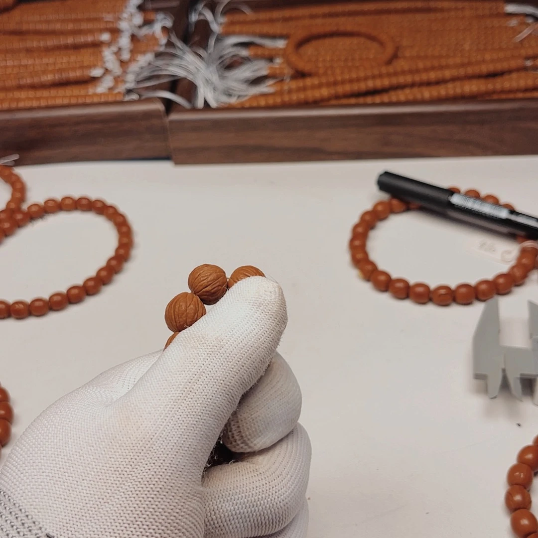 桃核吊坠董*长桃核光柱