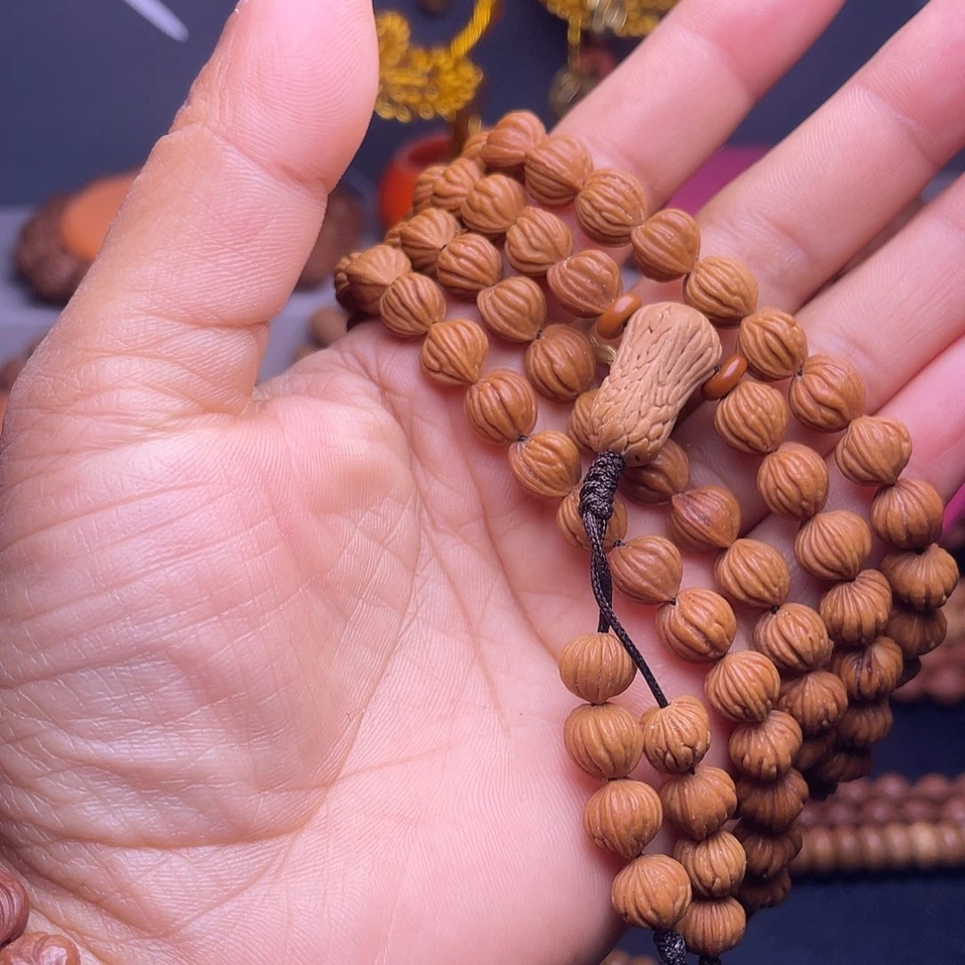 是***戏桃核吊坠秦岭龙纹桃核佛手脖挂