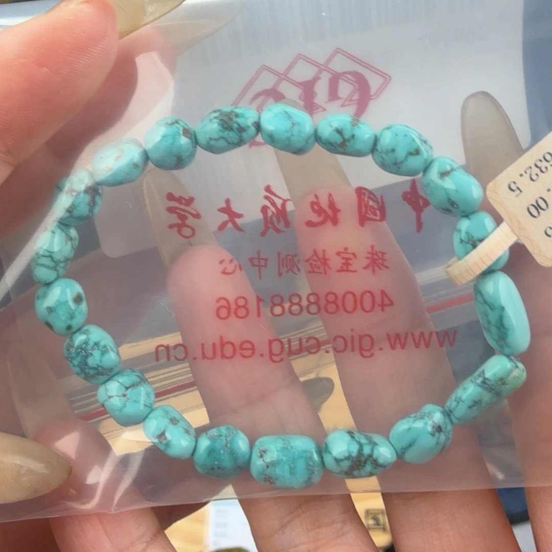 抬***笑绿松石未镶嵌珠宝奇石