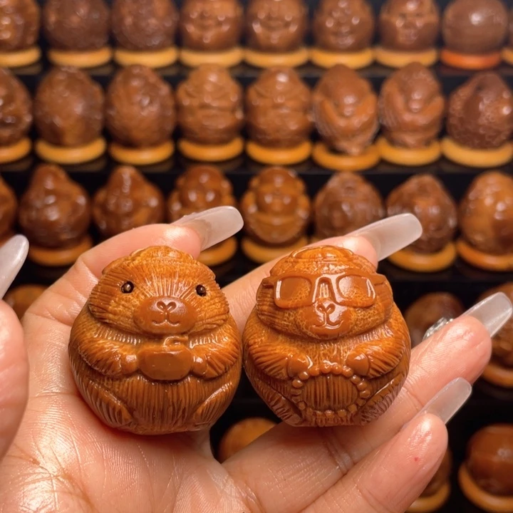 橄榄核把件乌****?橄榄雕刻