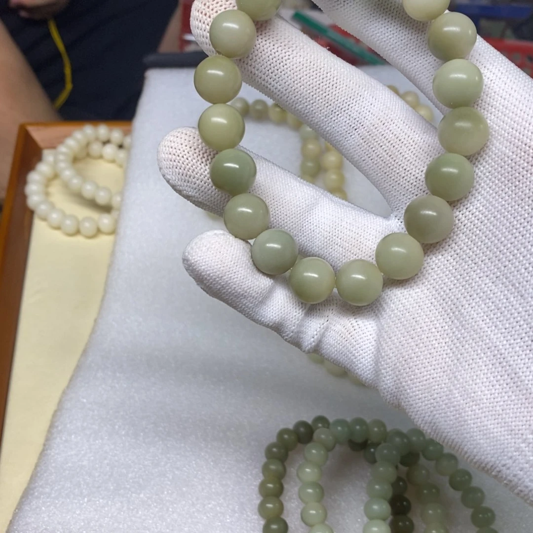 家***宝菩提根/象牙果把件宝