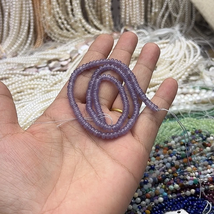 玛瑙/玉髓未镶嵌珠宝半成品一条4/2mm左右烟紫和田玉算盘珠