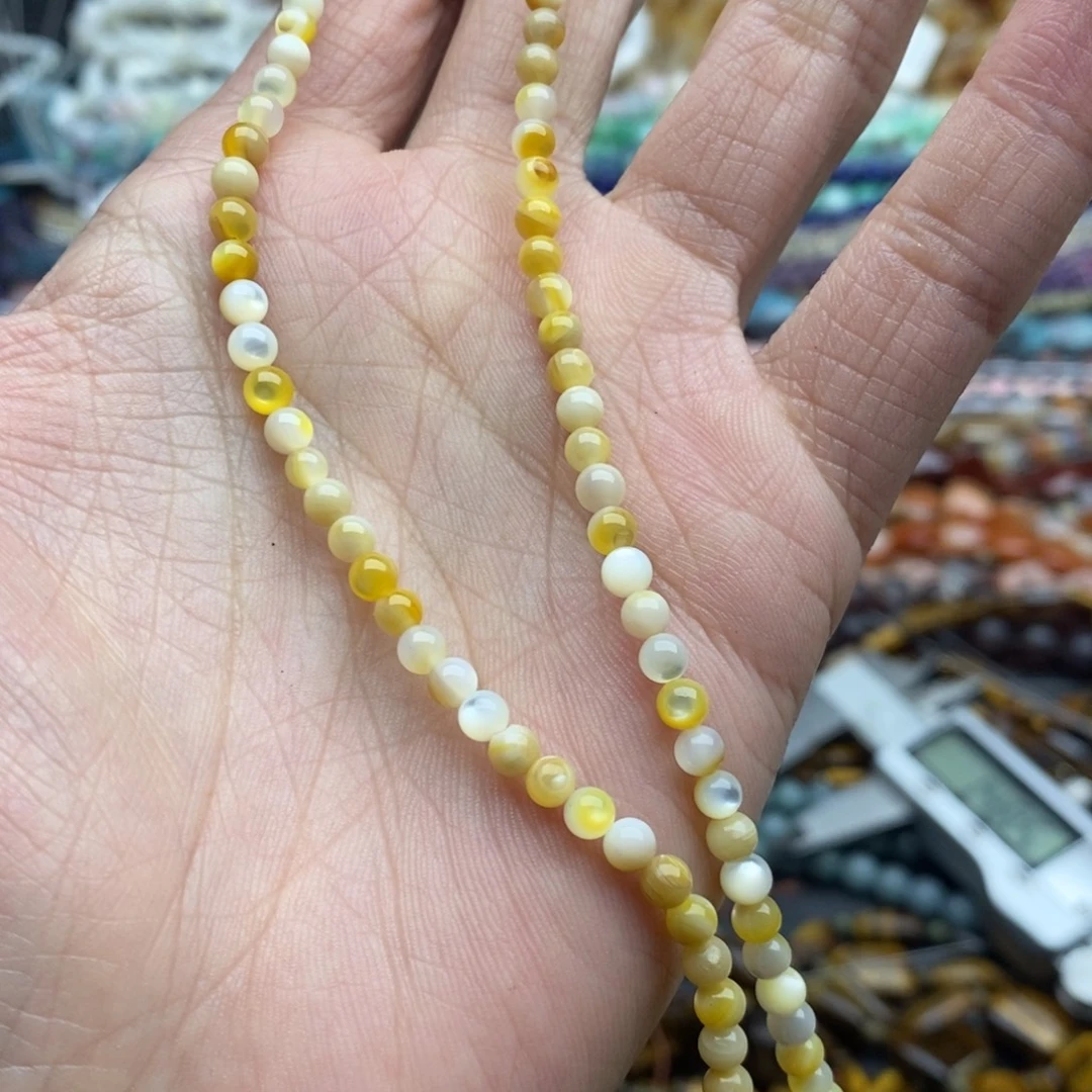 玛瑙/玉髓未镶嵌珠宝半成品一条天然4mm金蝶贝圆珠