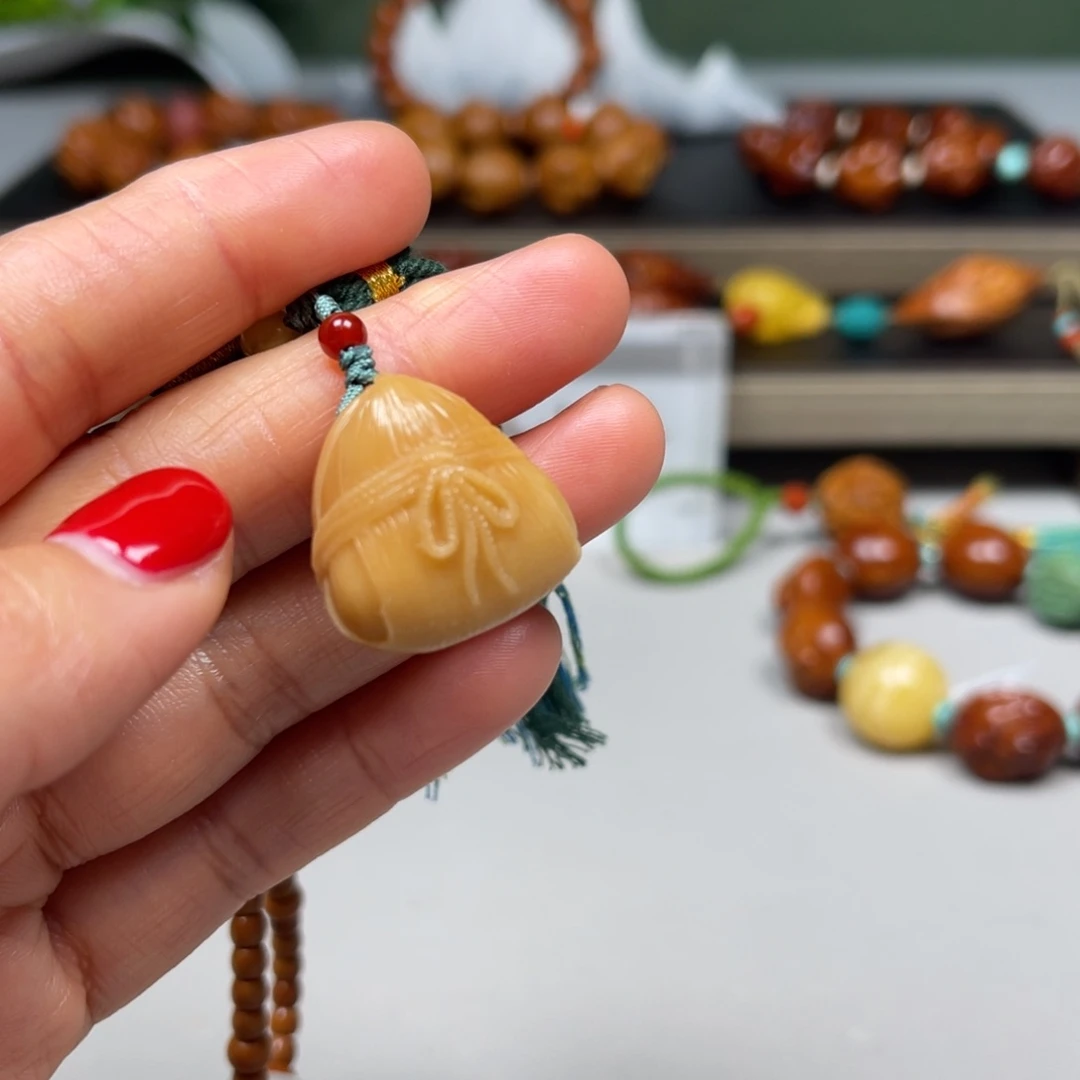 吊坠橄榄核一举高粽