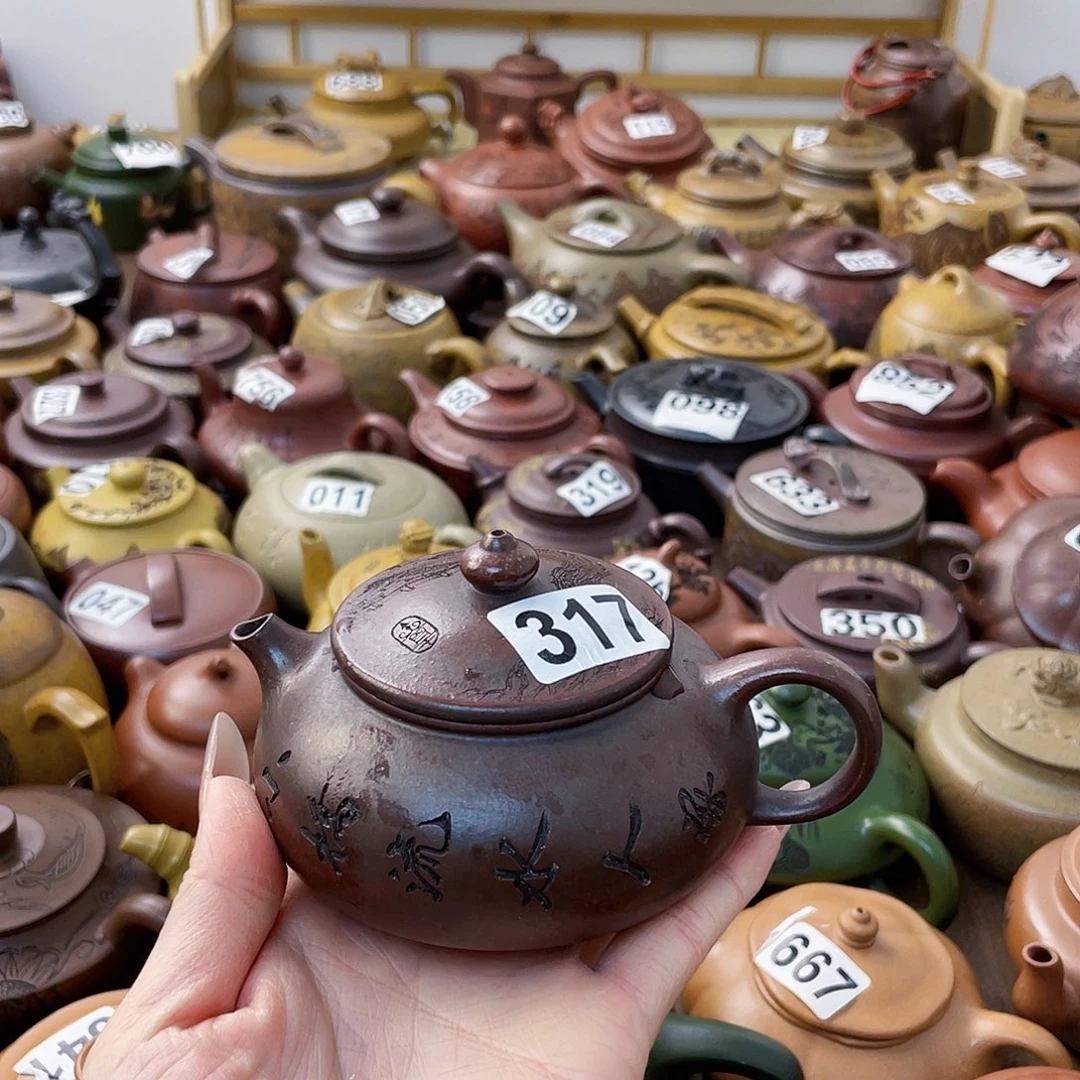 茶壶紫砂知**报紫砂微瑕