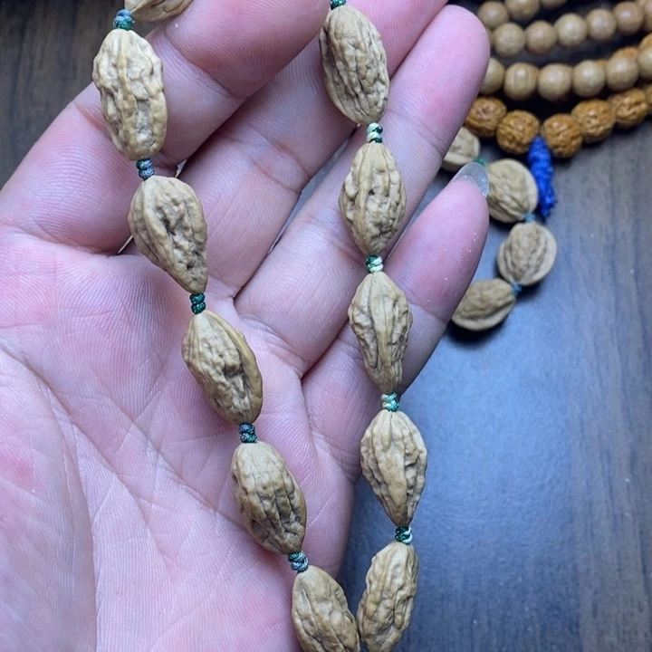 屿****文玩核桃吊坠文玩木质核桃手串