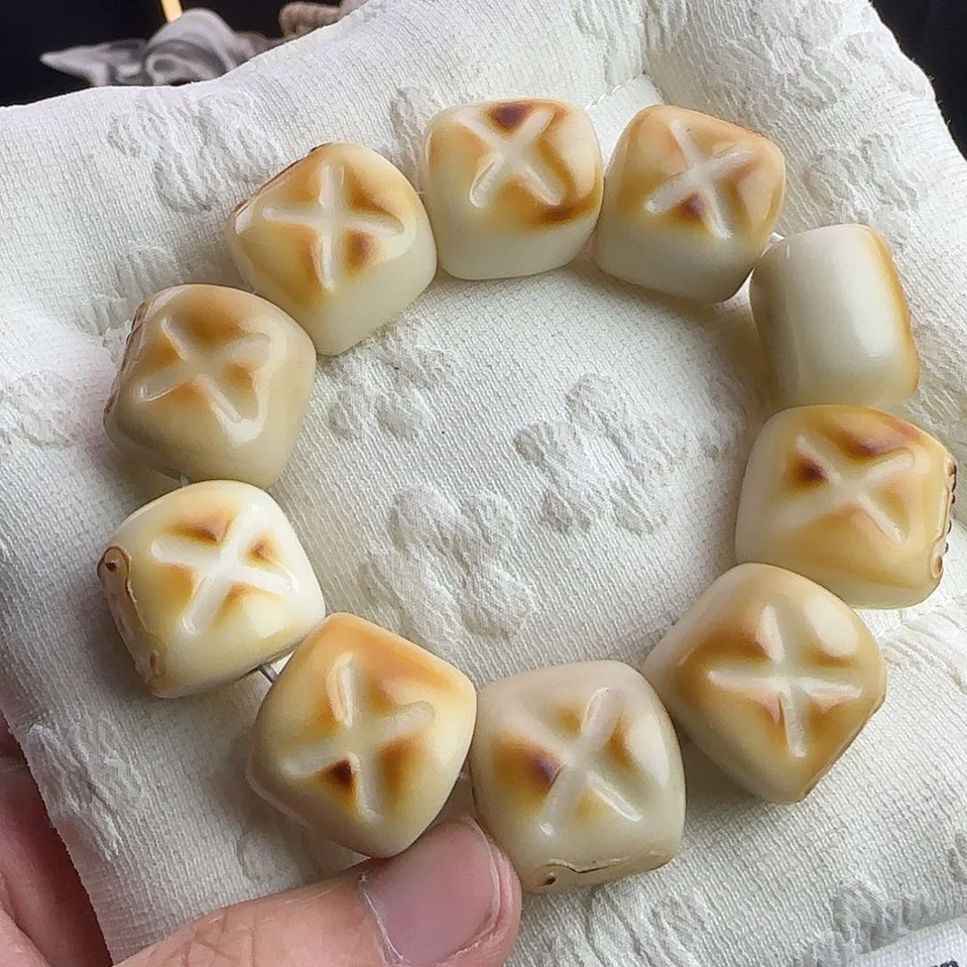 菩提根/象牙果吊坠微瑕疵炭烤棉花糖手串一条