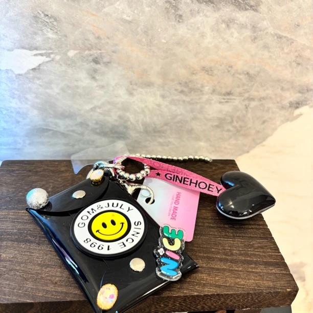 黑爱心蝴蝶结手机链SJL019