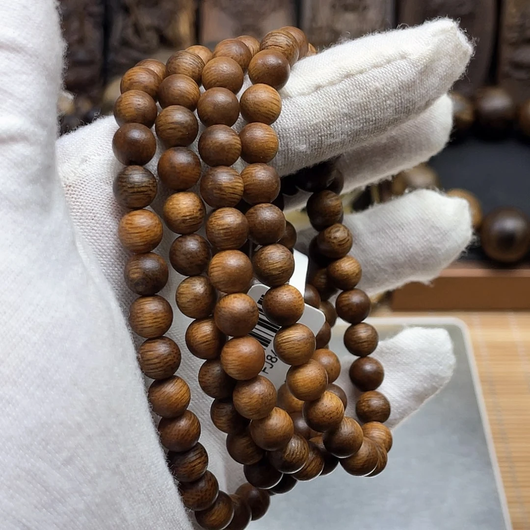 沉香手串豆*哥海南白奇