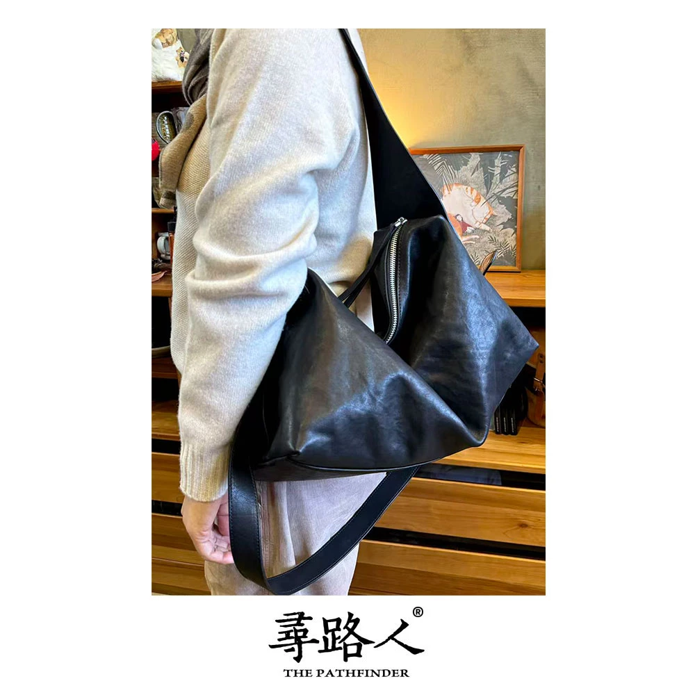 寻路人时尚休闲气质百搭通勤风牛皮单肩斜挎包