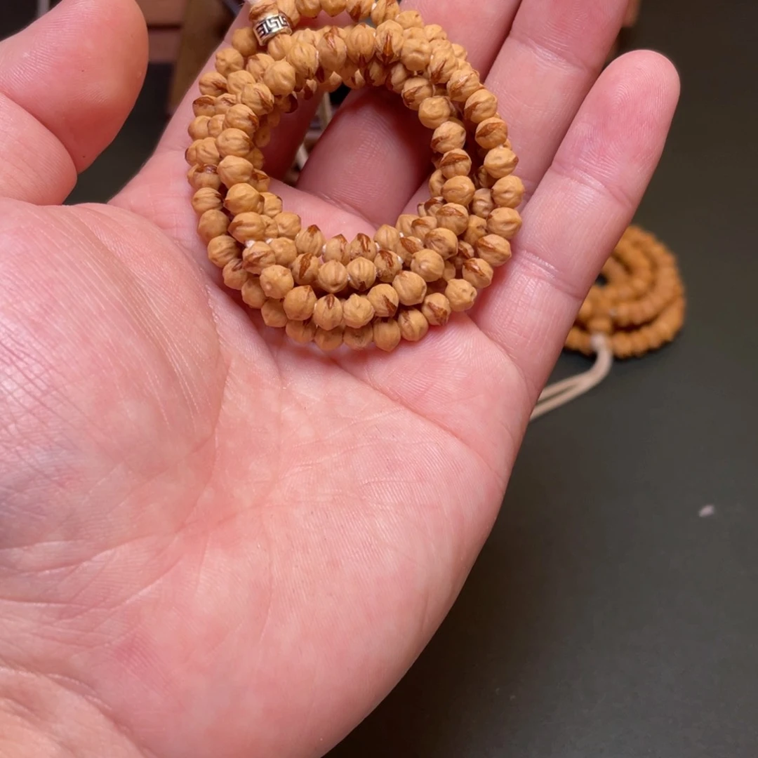 柏香籽/百香籽吊坠迷你红牙