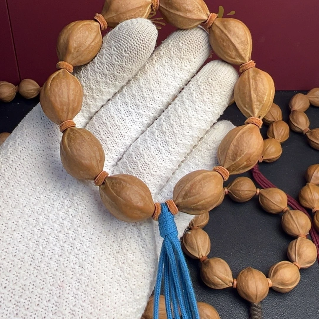 X***u橄榄核吊坠18-25梅林铁核