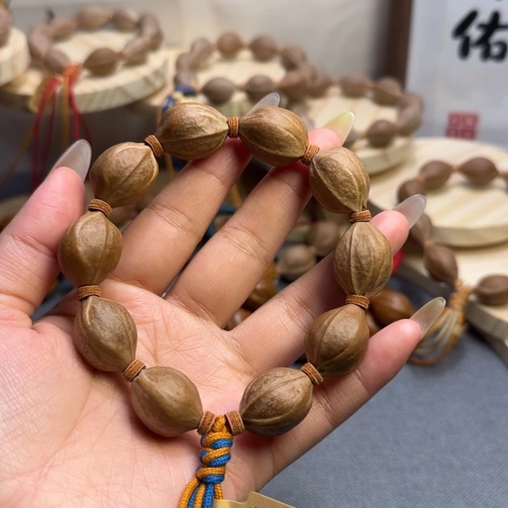 Y***c橄榄核手串梅林铁核文玩手串