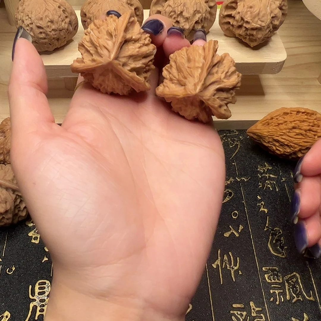 把件桃核盘山三棱38手把件