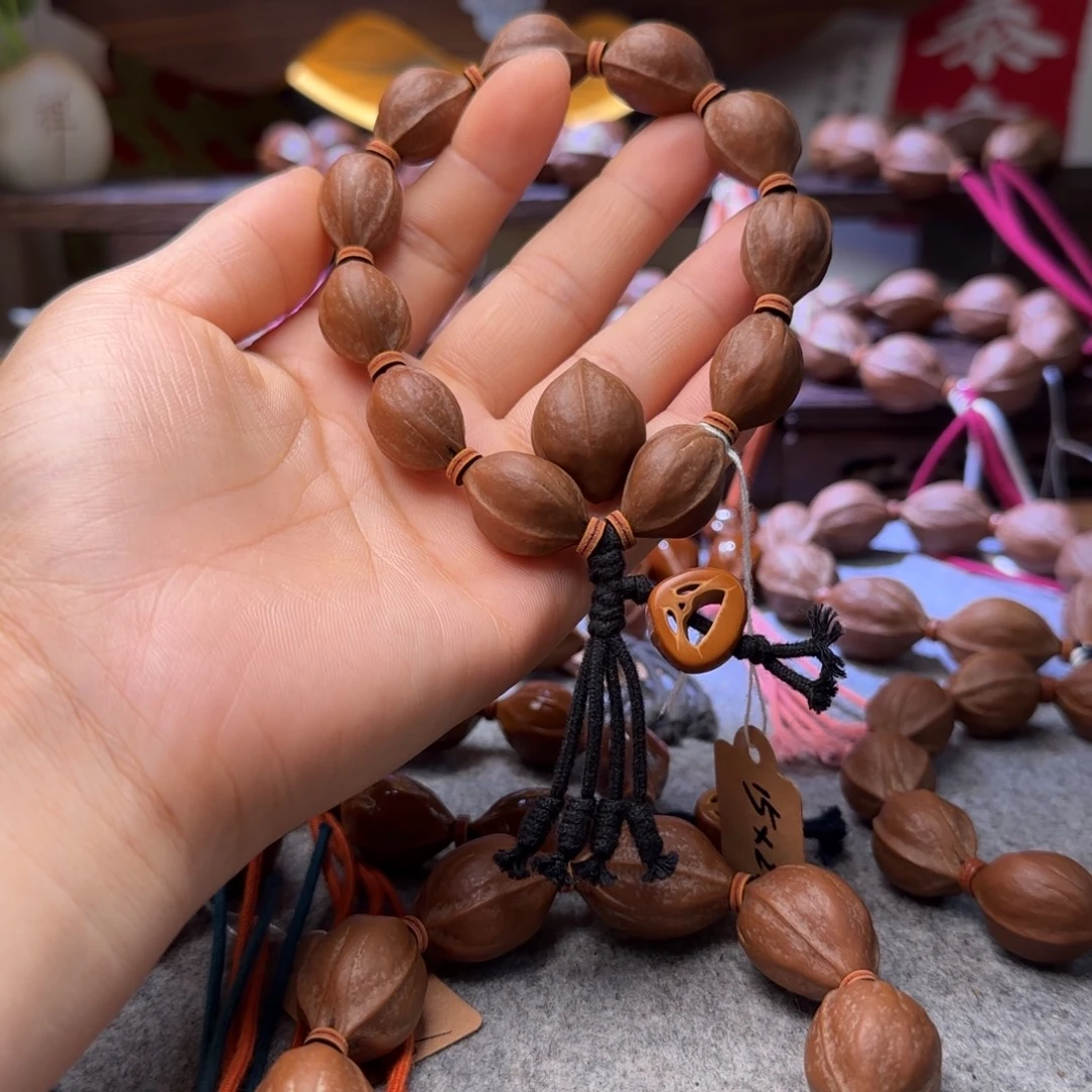 哎***橄榄核吊坠1522梅林铁核