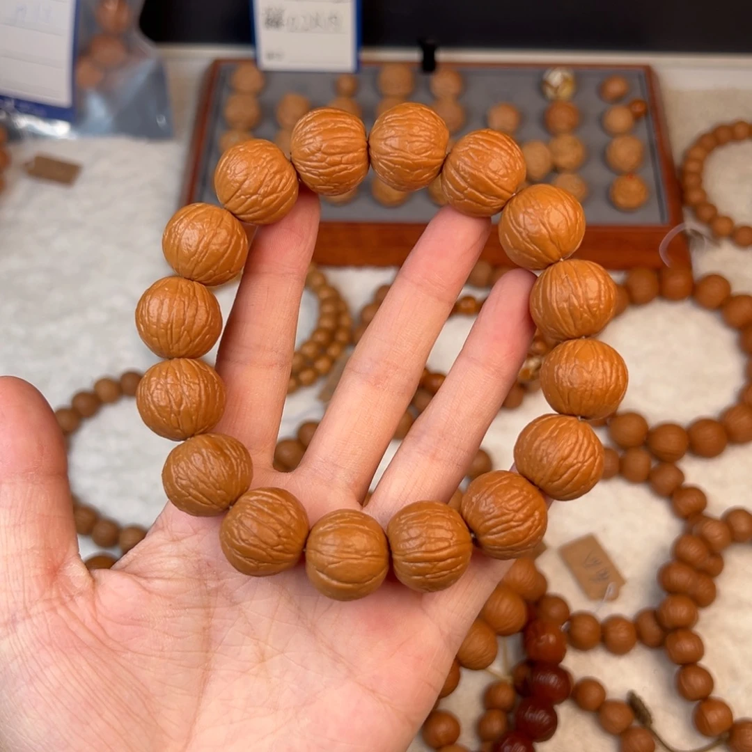 桃核手串聚宝盆 0.5误差  18➕